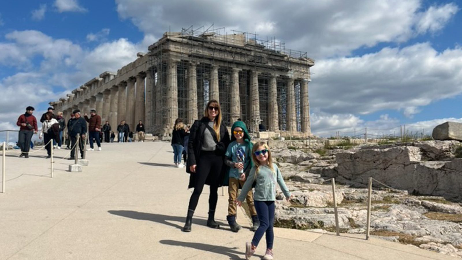 Carol, Calvin, and Millie in front of the Parthenon