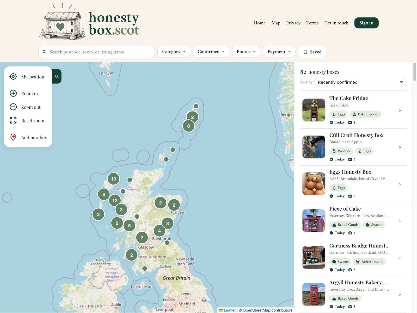 The honestybox.scot map of Scotland with green cluster pins showing honesty boxes across the Highlands, Borders, and islands, with a sidebar of recent listings
