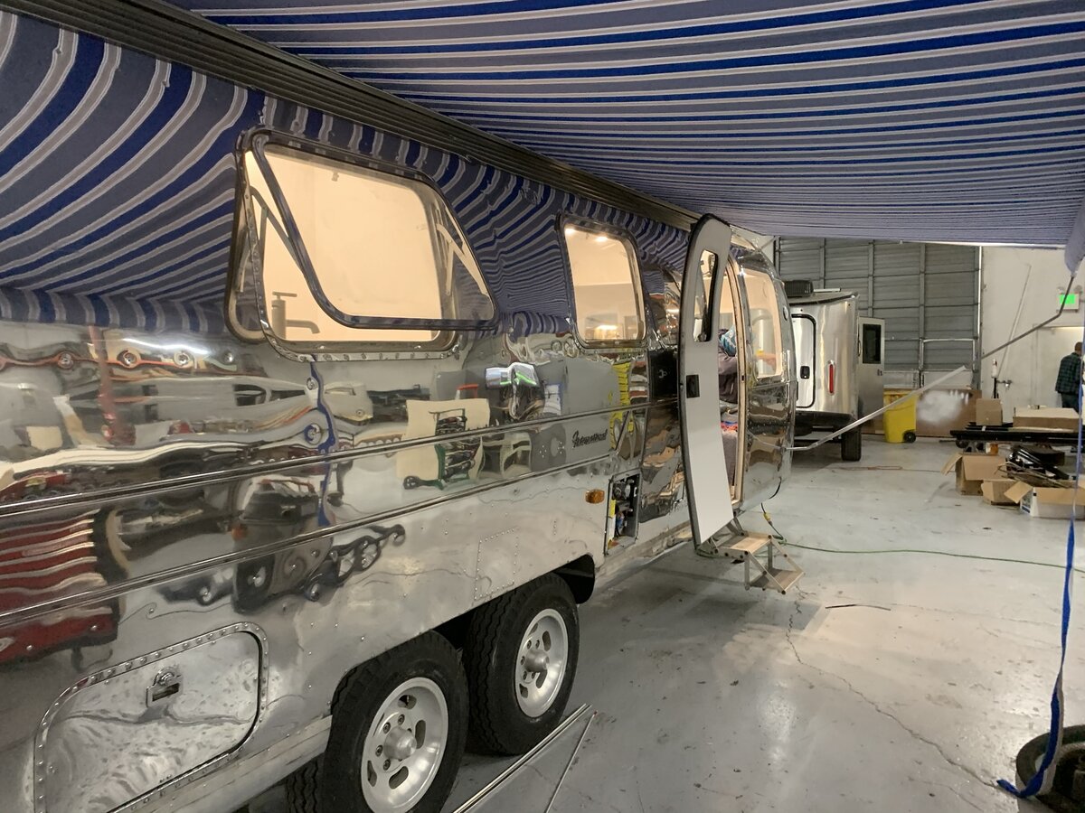 Family inspecting the progress